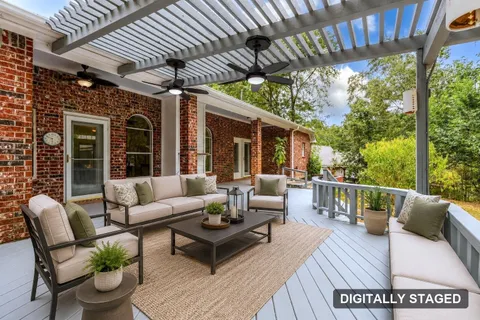 Covered patio, digitally staged with furniture (digitally staged)