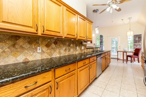 Kitchen with granite counters and stainless appliances