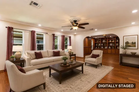 Formal living room, digitally staged (digitally staged)