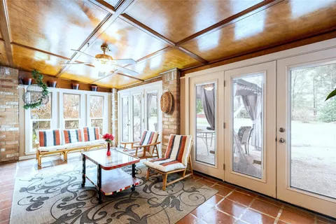 Sunroom overlooking the property