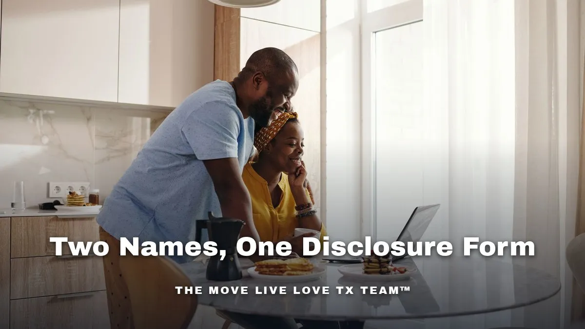 A couple sitting across a kitchen table reviewing paperwork together in bright morning light