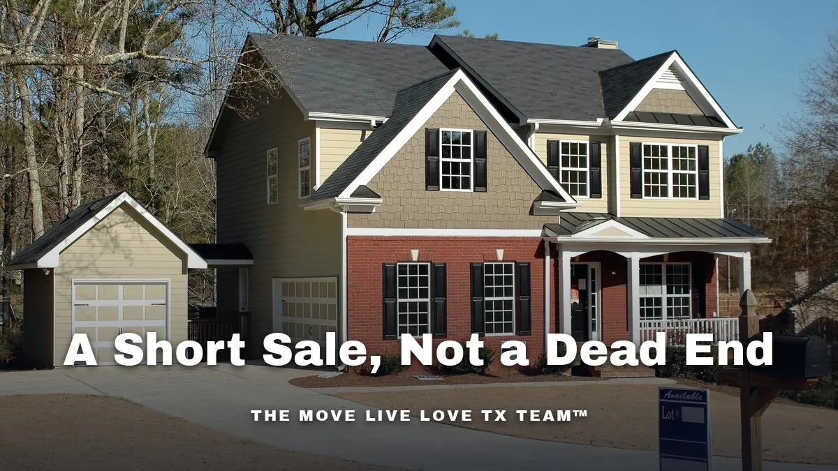 A two-story brick and siding home with a covered front porch and detached garage, with a real estate sign posted by the mailbox at the curb