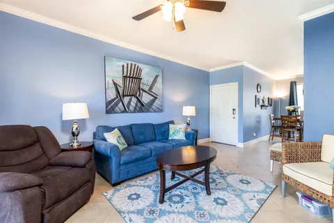 Open living and dining, tile floors throughout