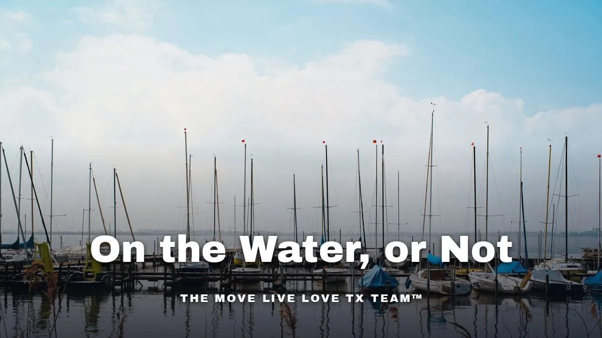A marina on Clear Lake near Houston at sunrise, sailboats docked along a wooden pier with calm water