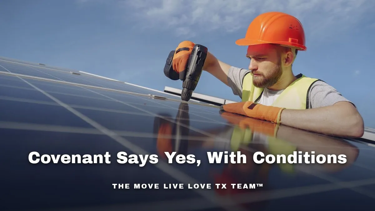 A Texas homeowner and installer looking up at solar panels on a residential roof in warm morning light