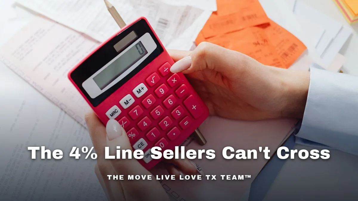 A hand using a red calculator over a desk covered in receipts and paperwork